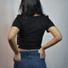 black corset style top with multiple vertical zippers